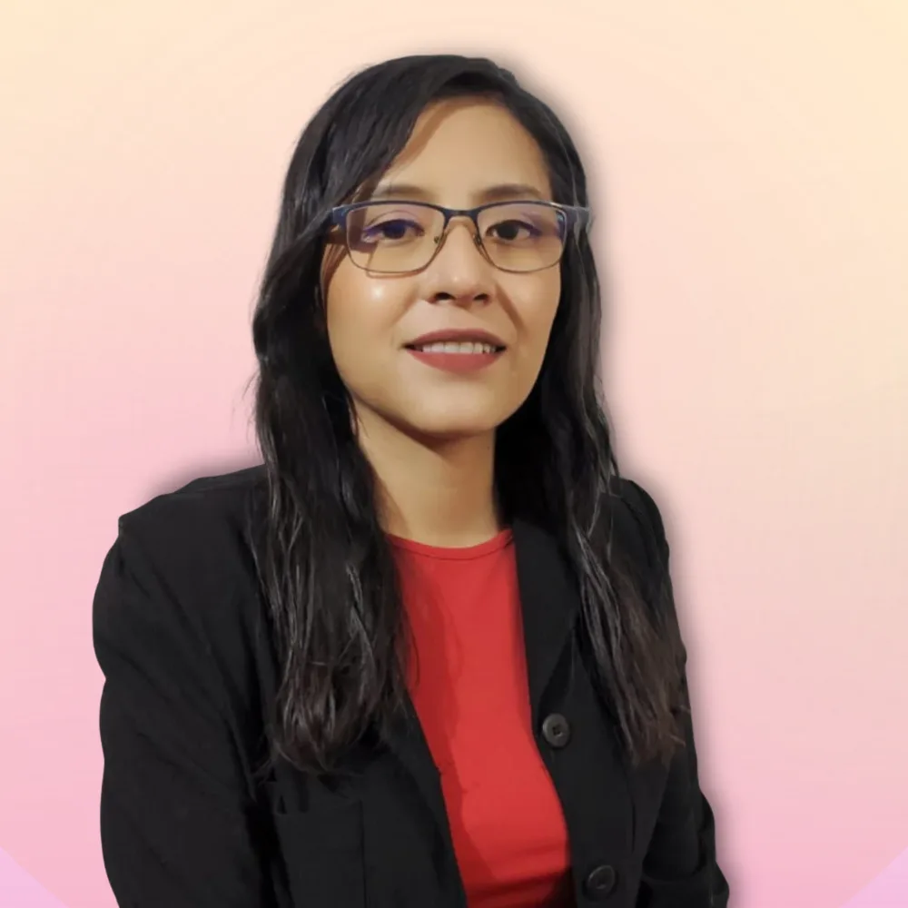 Portrait of Vanessa, a Mexican teacher from Querétaro smiling in glasses and a red top
